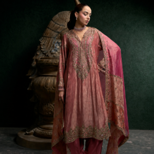 Royal rose gold metallic tissue suit with heavy embroidery paired with a matching tulip salwar.