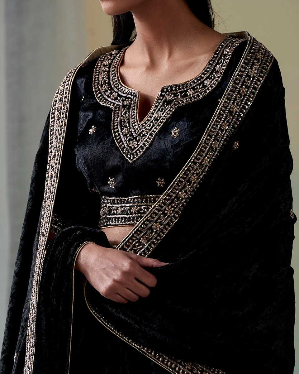 Black hand-embroidered zardozi velvet kalidaar lehenga set with blouse and doshala by CoutureCraze
