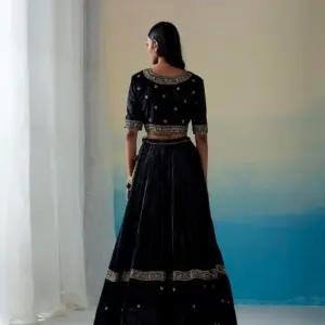 Black hand-embroidered zardozi velvet kalidaar lehenga set with blouse and doshala by CoutureCraze