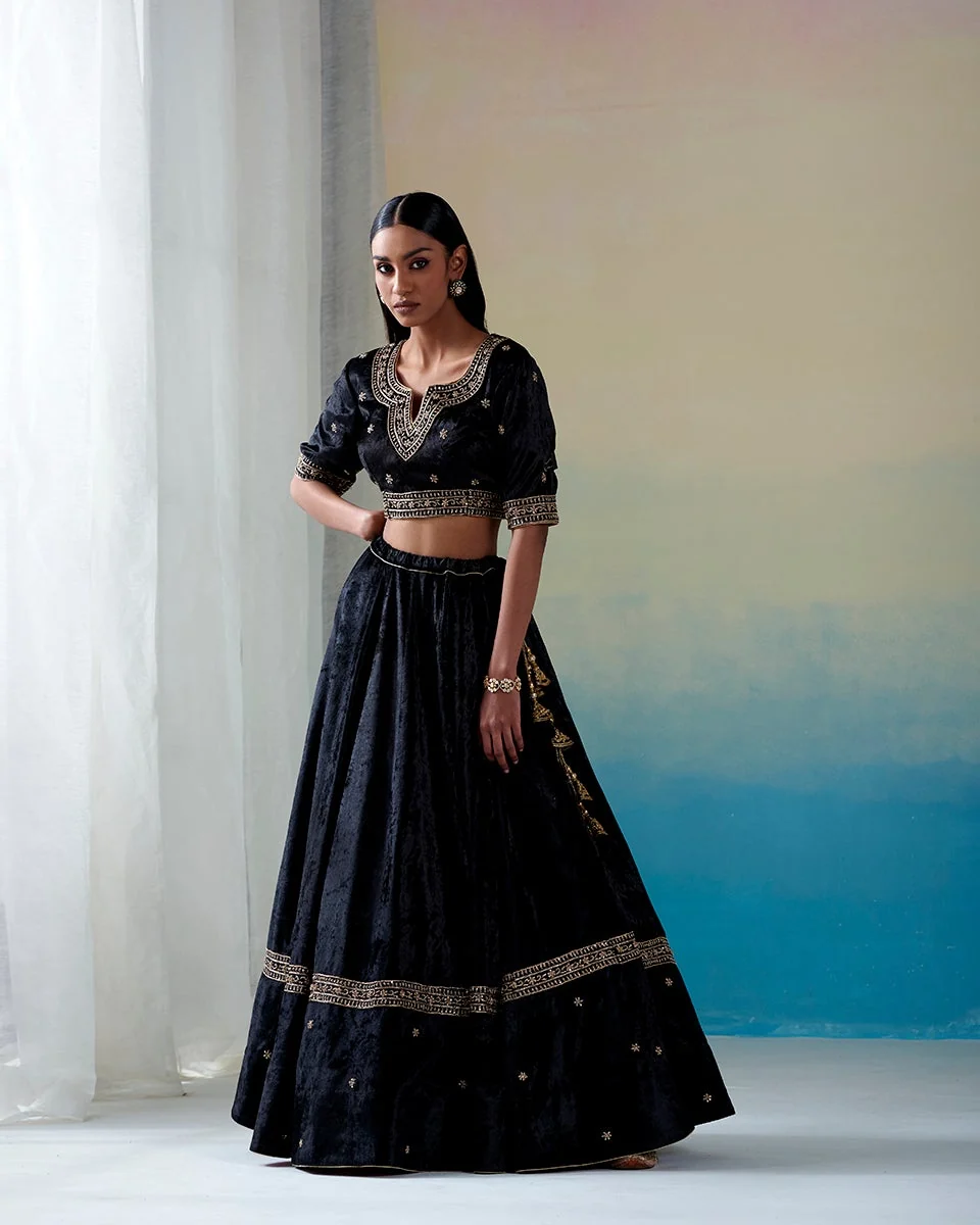 Black hand-embroidered zardozi velvet kalidaar lehenga set with blouse and doshala by CoutureCraze