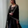 Black hand-embroidered zardozi velvet kalidaar lehenga set with blouse and doshala by CoutureCraze