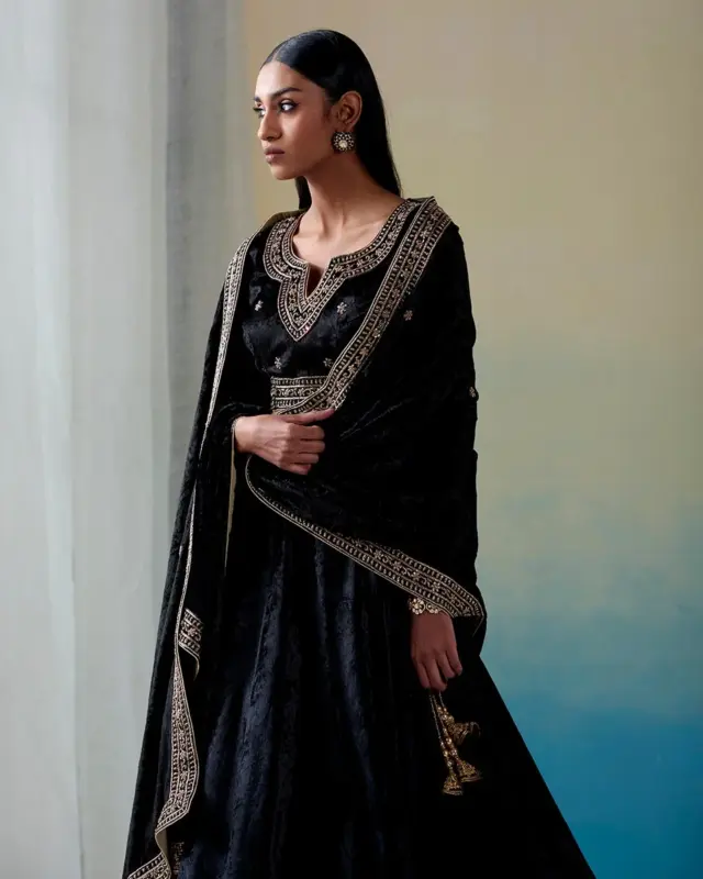 Black hand-embroidered zardozi velvet kalidaar lehenga set with blouse and doshala by CoutureCraze
